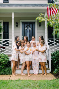 Bridal party drinks mimosas at a country club wedding