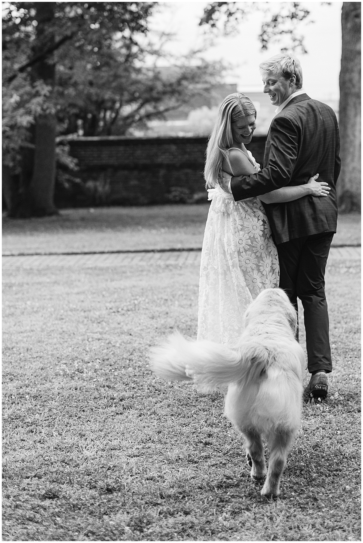Dog Playful Chases Couple During Their Engagement Photoshoot