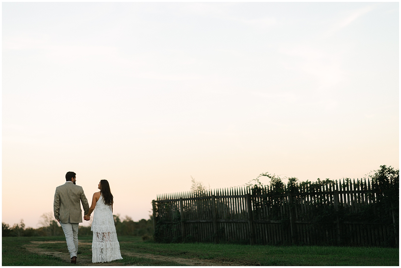 Couple Walking Together During Sunset, Holding Hands, for Engagement Photoshoot
