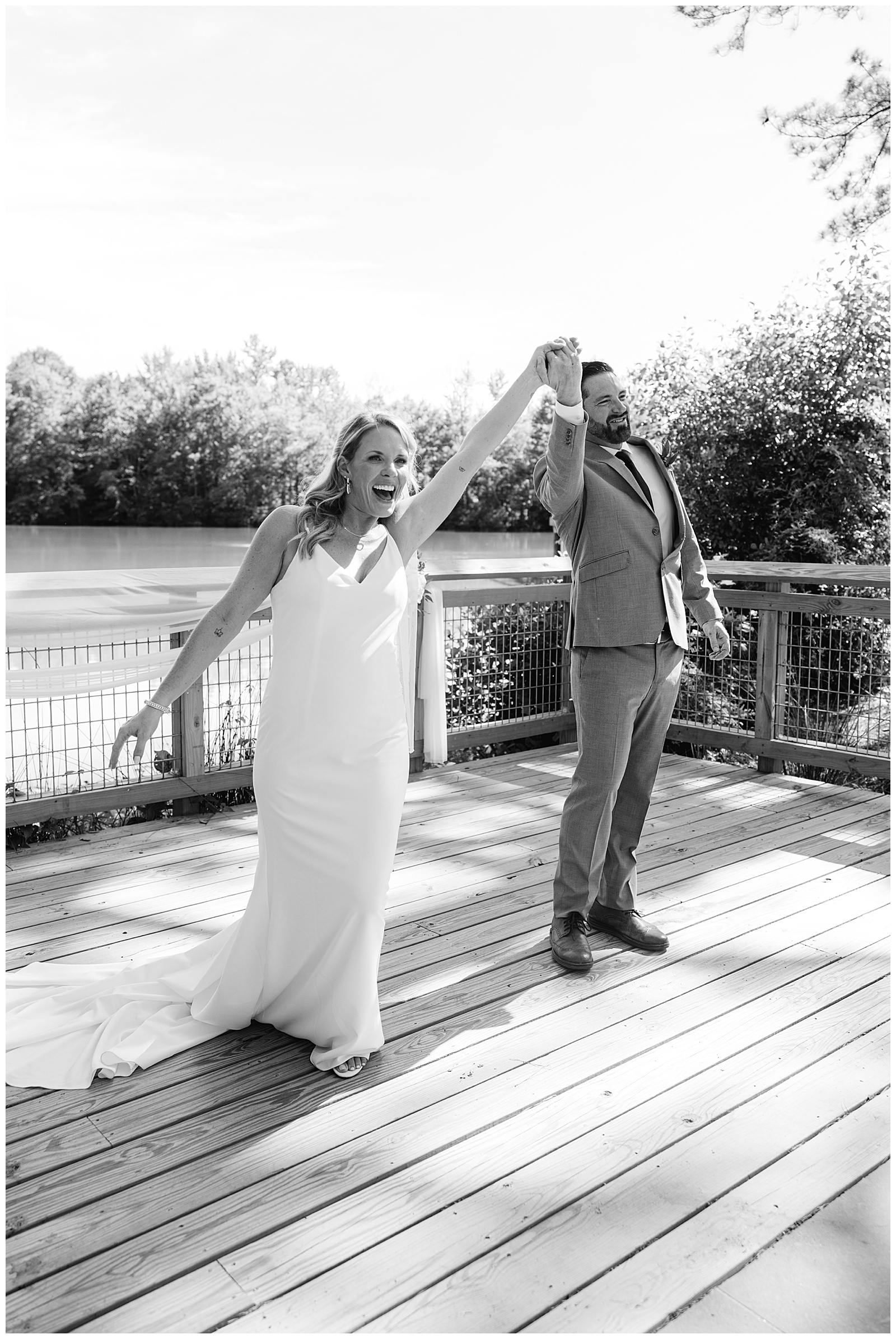Bride and Groom Hold Hands in Air, Celebrate After Being Pronounced Married